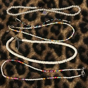 4 necklaces, 1 bracelet!